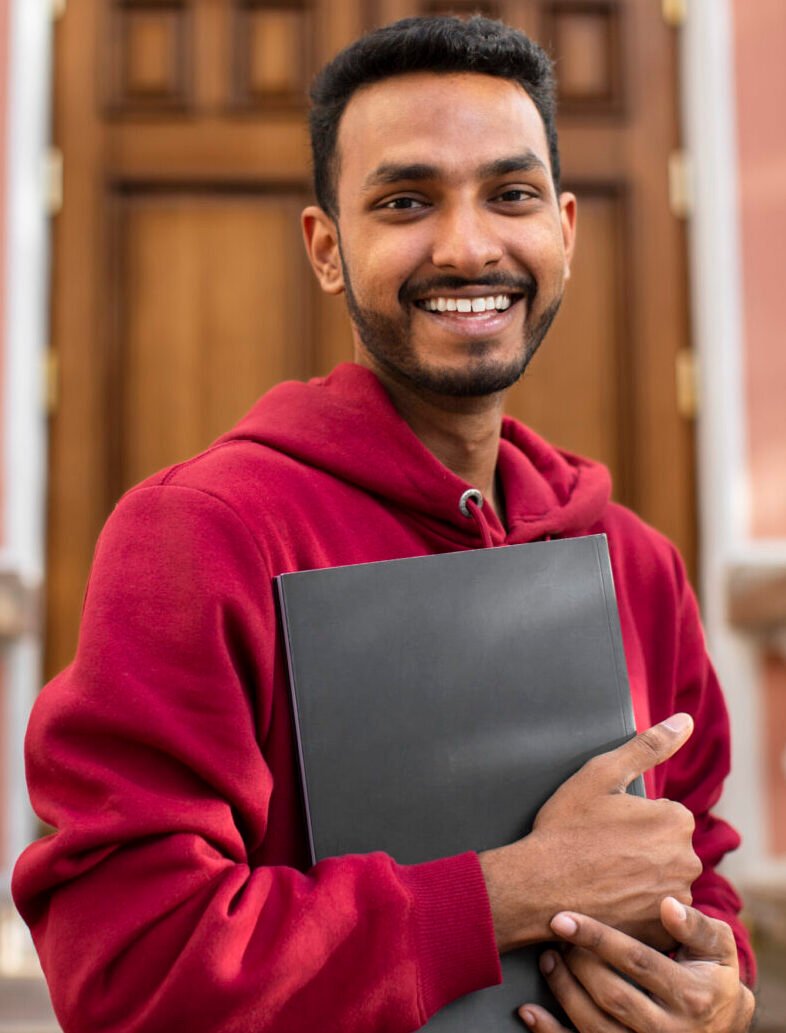 front-view-smiley-man-holding-book